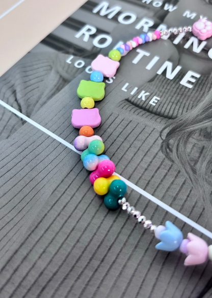 【CharmLink】Charming Pastel and Iridescent Beaded Phone Charm – Featuring Cute Flowers, Bows, and Colorful Beads for a Playful and Stylish Look