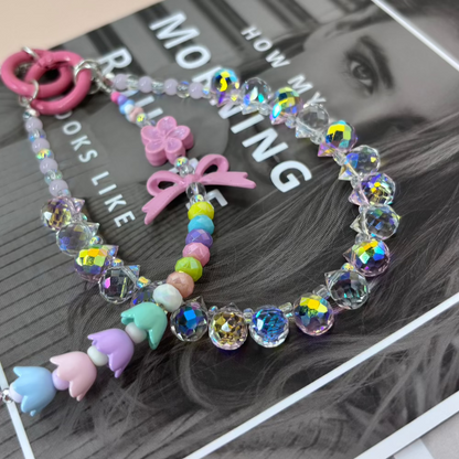 【CharmLink】Charming Pastel and Iridescent Beaded Phone Charm – Featuring Cute Flowers, Bows, and Colorful Beads for a Playful and Stylish Look